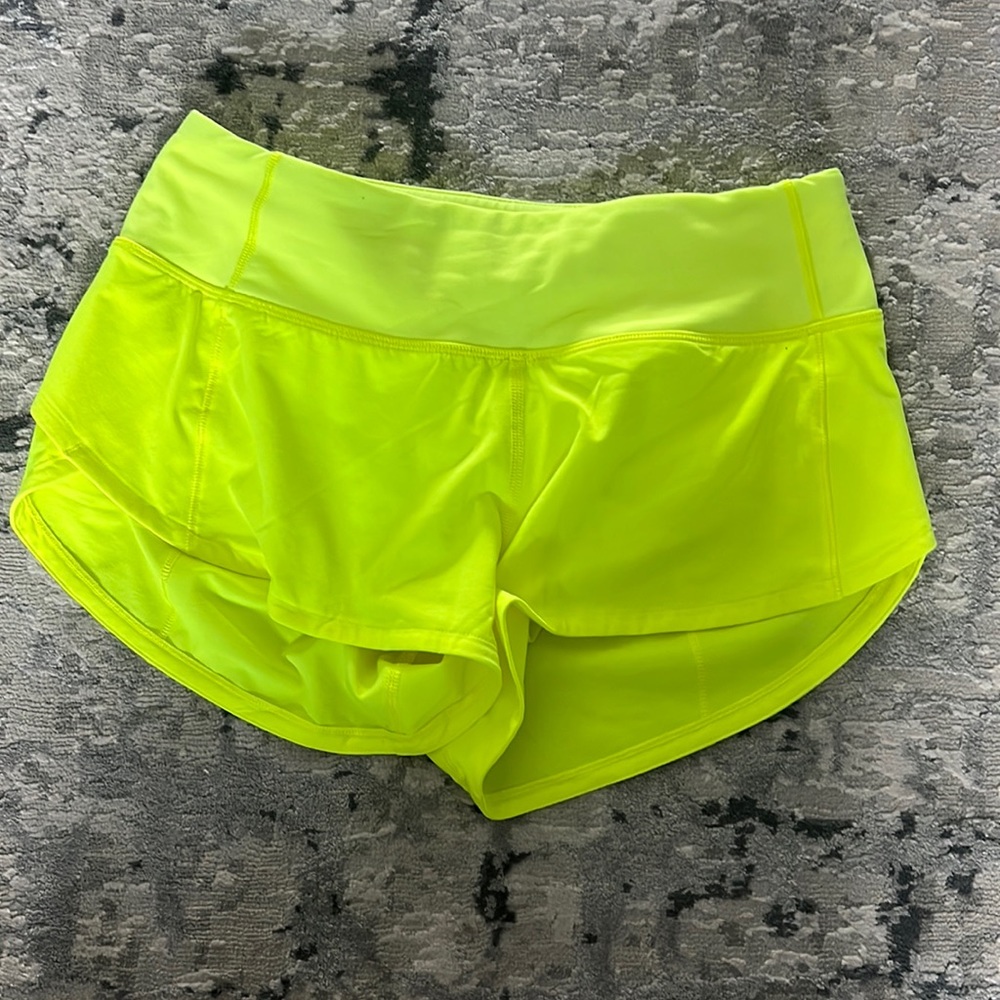 NEON YELLOW LULULEMON SPED UP SHORTS SIZE 0
